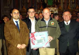 Da sinistra il sindaco, Luca Gosso, l'assessore alla Cultura, Marco Gallo, il presidente della Corale Valle Maira, Guido Rinaudo, e l'assessore provinciale al Turismo, Angelo Rosso